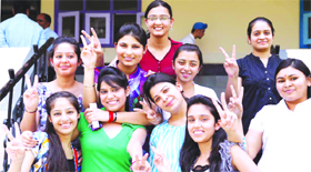 Students of CT Public School in a cheerful mood after doing well in the CBSE Class XII exams in Jalandhar on Monday.