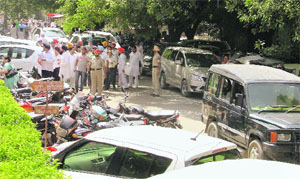 Vehicles parked haphazardly at the Mini Secretariat in Ludhiana on Monday.