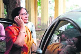 Ujjwala Sharma talks on her mobile phone outside the house of ND Tiwari in Dehradun on Tuesday