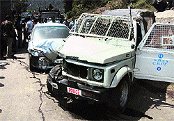 A car which collided with a CRPF Gypsy at Tringla in Batote on Tuesday