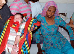The lady, who went into labour aboard the Jammu-Tawi Express, delivered a baby girl at the Women and Children Hospital in Bathinda. 