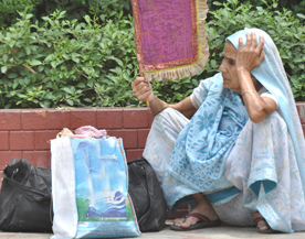Delhiites finding it hard to bear the heat.