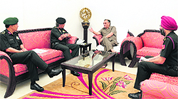 Uttarakhand CM Vijay Bahuguna holds a meeting with the Army Commander, Central Command, Lt. General Anil Chait, in Dehradun on Wednesday.