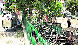 Garbage carts parked inside a park at Sodal Nagar in Ward 21 in Jalandhar