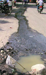 A road in a pitiable condition.