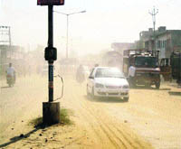 Construction work is yet to resume on this stretch of Raikot Road in Jagraon. 