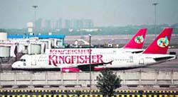 Kingfisher Airlines aircraft parked on the tarmac at the New Delhi international airport