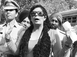 Fiza alias Anuradha Bali in police custody at District Court in Mohali on Thursday. Tribune photo: Parvesh Chauhan