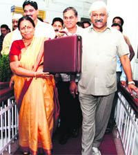 Finance Minister Indira Hriyadesh enters the Assembly in Dehradun on Thursday.