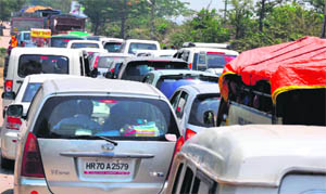 Traffic came to a halt on the NH-58 as people from nearby states poured in to the city for two festive baths in Haridwar on Thursday. 
