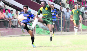 Players in action during a match in the Narendra Kharola Memorial All-India Football Tournament in Dehradun on Thursday