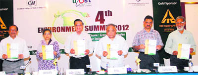 Dr RS Tolia, former Chief Secretary of Uttarakhand (centre), releases the 3rd Environment Summit report in Dehradun on Thursday.