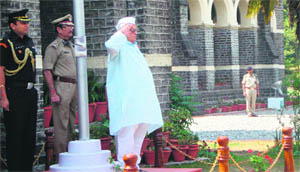 Governor Aziz Qureshi takes the salute at a guard of honour by PAC jawans on his visit to Nainital Raj Bhawan on Thursday.