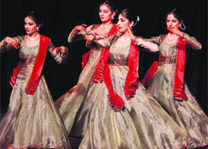 Artistes perform a dance during a function in Gurgaon. 