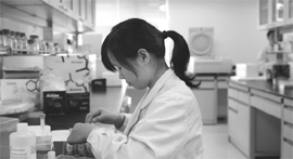 A researcher prepares medicine at a laboratory at Nanjing University in Nanjing, Jiangsu province, in this April 29, 2011, file photo. China has increased its spending on science at a blistering rate and now publishes the second most scientific papers in the world after the US. However, interviews with Chinese scientists working in the West suggest restrictive political and cultural attitudes continue to stifle science there. 