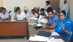 Bathinda MP Harsimrat Badal addresses a meeting of vigilance and monitoring committees of Bathinda and Mansa districts at Badal village. A Tribune photograph
