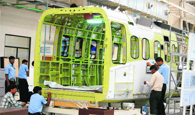 Technicians work in the Sikorsky S-92 helicopter cabin manufacturing facility at Tata Advanced Systems Ltd in Hyderabad. India's factory sector continued to expand in May, a key survey showed on Friday, indicating some confidence in Asia's third-largest economy after the release of dire growth data. The HSBC India Manufacturing Purchasing Managers' Index (PMI), a measure of factory output, was marginally down to 54.8 in May from 54.9 in April