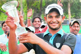 Harendra Gupta celebrates his victory after winning the PGTI Players Championship at the Chandigarh Golf Club on Thursday.