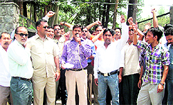 Members of the ONGC Contractual Employees Union stage a demonstration in support of their demands in Dehradun on Friday