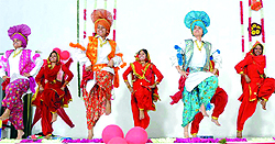 Students of the Army College of Nursing perform bhangra during the annual day function in Jalandhar Cantonment on Saturday