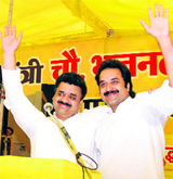 Former Deputy Chief Minister Chander Mohan and Hisar MP Kuldeep Bishnoi (right) are all smiles after the former joins the Haryana Janhit Congress at Adampur, near Hisar, on Sunday.