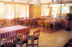 A hotel wears a deserted look due to unscheduled power cuts in Jammu on Sunday