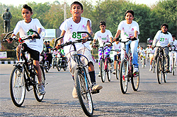 Children take part in the Jammu Cyclothon on Sunday