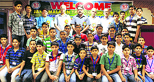 A batch of trekkers poses for a photograph in Jammu on Sunday