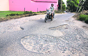 A damaged road in Urban Estate-1 in Ward 33 in Jalandhar. Photo: Sarabjit Singh