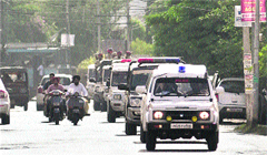 The Ludhiana police takes out a flag march on Sunday. Tribune photo: Himanshu Mahajan