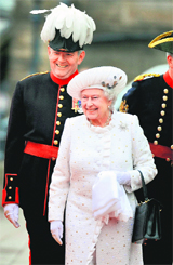 Queen Elizabeth II arrives at Chelsea Pier during the Diamond Jubilee river Pageant in London on Sunday.