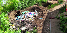 Plastic bottles dumped in a pit at a village in the Parbati valley.