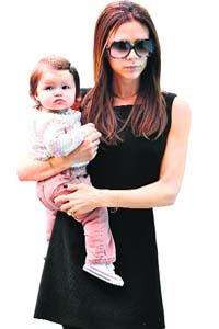 Gorgeous girls: Victoria Beckham with daughter Harper