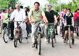 Panjab University Vice-Chancellor Prof RC Sobti takes part in a cycle rally to mark the World Environment Day on the campus on Tuesday. 