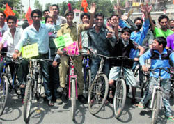 ABVP workers take out a cycle rally on World Environment Day in Dehradun on Tuesday.