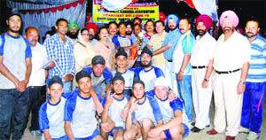Kabaddi players pose for a group photograph along with dignitaries at Jammu on Tuesday.
