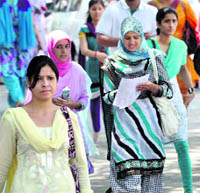 Students come out of the Government Women College after taking an entrance examination in Jammu on Tuesday.