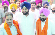 Cabinet minister Bikram Singh Majithia flanked by Narinder Singh Tung (right) and Rakesh Sharma, who joined the SAD in Amritsar on Wednesday. 
