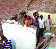 The collapsed roof of a house where the mishap occurred at the Lalla Basti of Jalalabad in Fazilka district on Wednesday