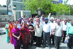 BSNL staff staging protest in front of the office of General Manager Telecom District (GMTD), Bathinda, in Bharat Nagar on Wednesday