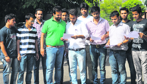 SOPU members come out of the VCs office after submitting a memorandum at Panjab University, Chandigarh, on Wednesday.