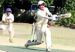 A player in action in a match during the Arun Singh Kathait Memorial Women Cricket Tournament in Dehradun on Wednesday