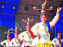 Artistes from Sirmaur district present a traditional dance during the Summer Festival in Shimla on Wednesday