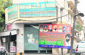A billboard put up by SAD candidate Kamaljit Singh Bhatia, who has won unopposed from Ward 45, outside a school in Jalandhar