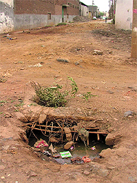 An uncovered manhole