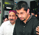Pakistan Chief Justice Iftikhar Chaudhry with son Arsalan.