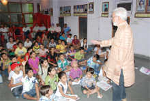 Tony Batish giving tips to children at the theatre workshop at the Public Library in Bathinda on Thursday.