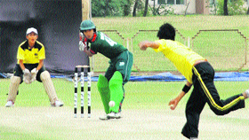 A batsman plays a shot during the match between Jharkhand and Bangladesh at Tau Devi Lal Stadium, Sector 3, Panchkula, on Thursday.