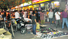 Encroachments continue at the parking and corridor in the market at Sector 22 in Chandigarh on Thursday evening.