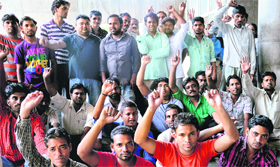 Sweepers protest at the Government Medical College and Hospital in Sector 32 of Chandigarh on Thursday.